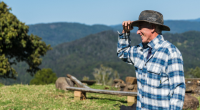 local rancher look at his field